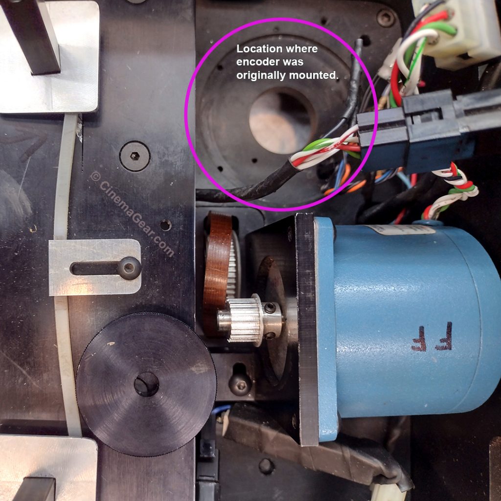 A close up of the Dykstraflex follow focus motor and sprocket from the film side of the camera