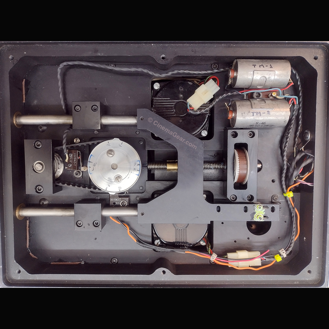 A look at the inside of the mechanical side of the Dykstraflex camera. It shows the follow focus drive, the film transport drive, and the torque motor take-up electronics
