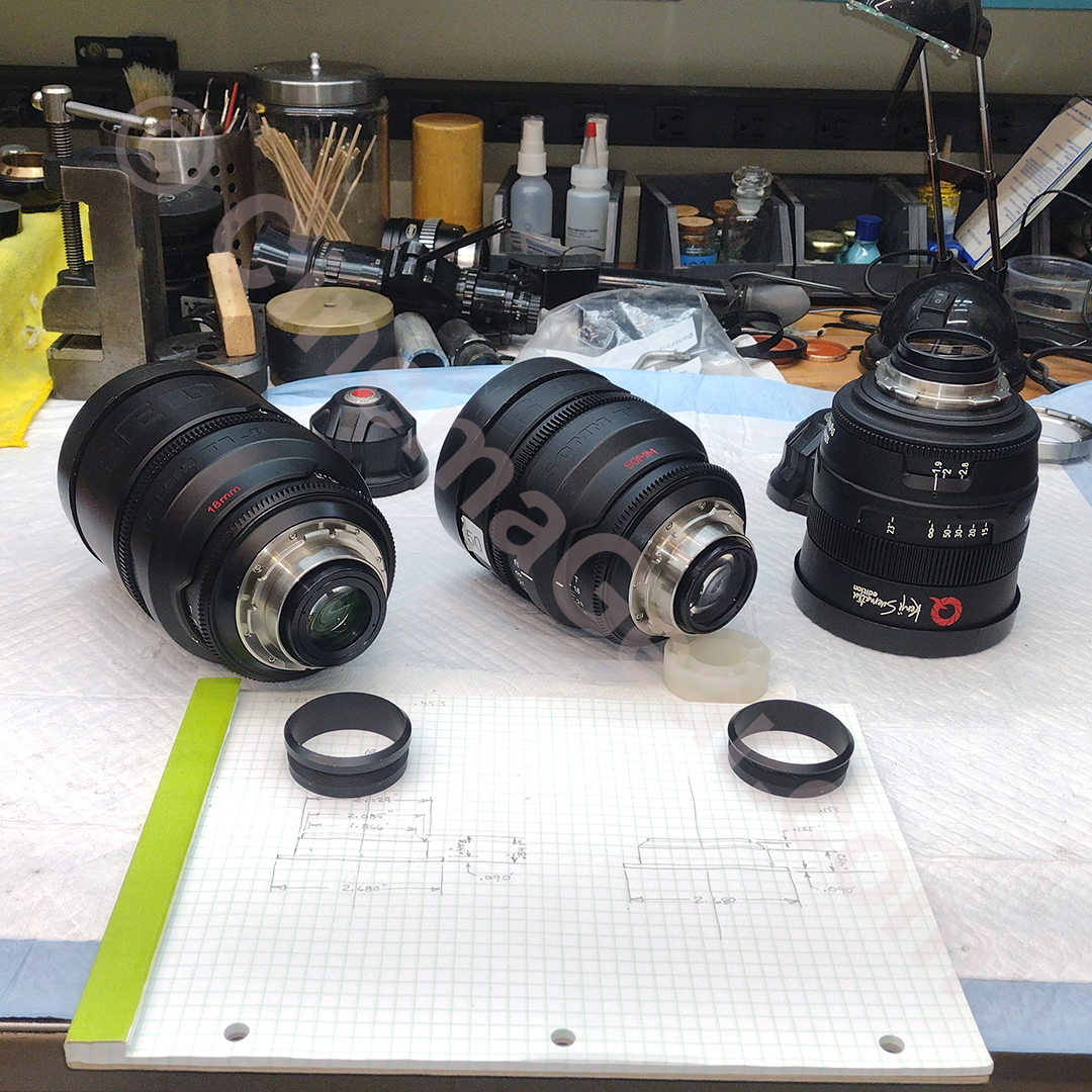 The 18mm and 50mm lenses, beauty rings removed to measure and document what is to be machined off of the 18mm beauty ring.