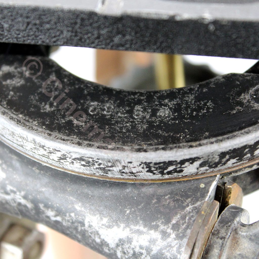 Close-up of the serial number stamped into the metal under the pan/tilt head.