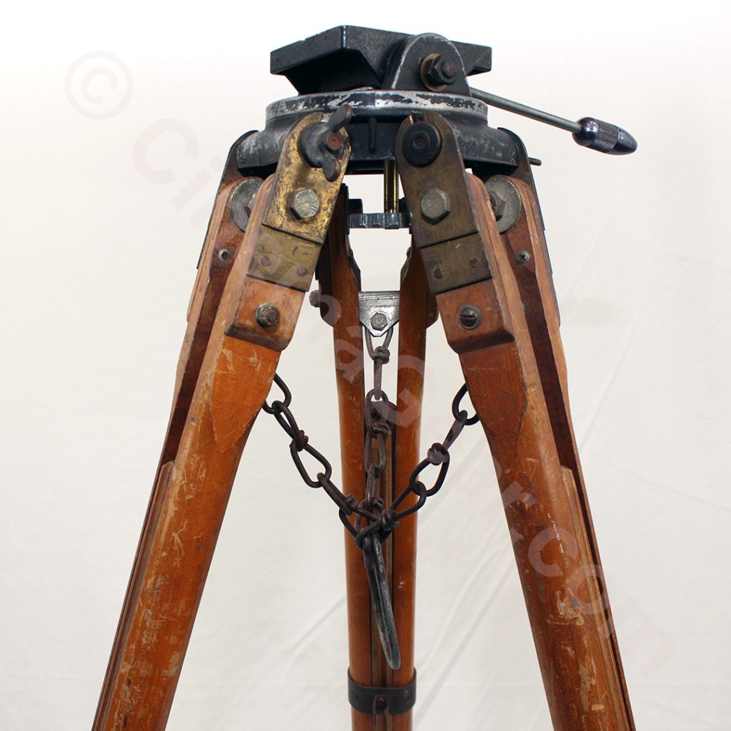 Close-up of the top of the tripod with focus on the area where the legs attach to the top.
