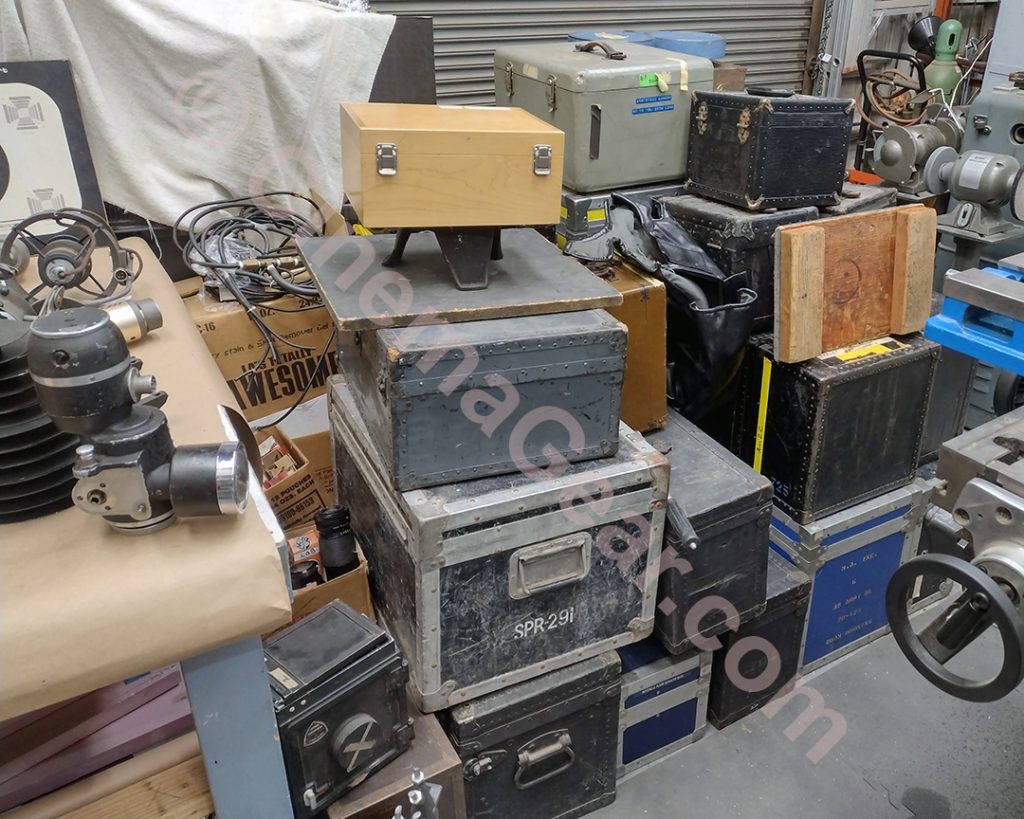 A tower of film equipment cases and loose items out of MovieTech Studios storage space