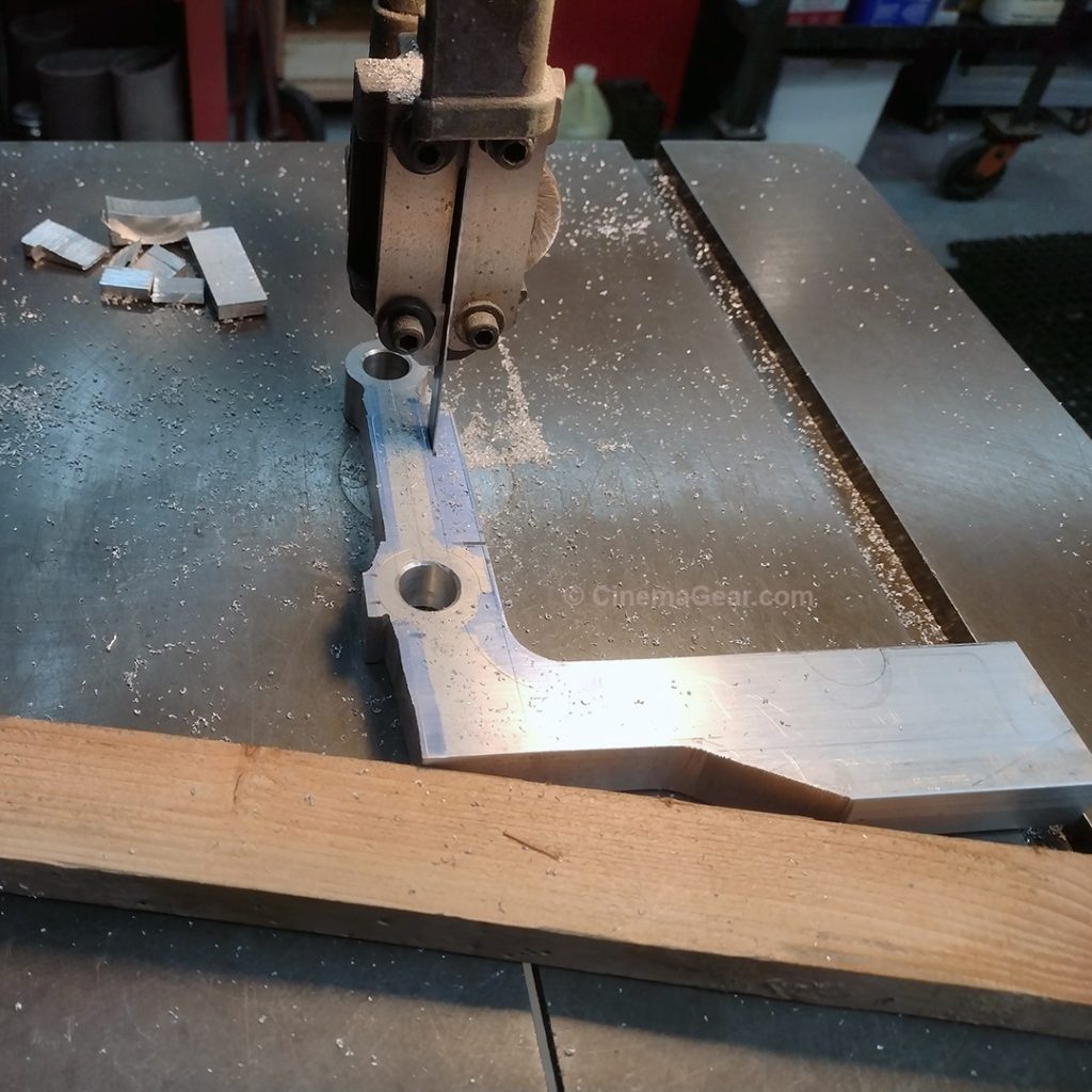 beginning to lighten and sculpt the rough machined aluminum for the lens support bracket for the Mitchell 205