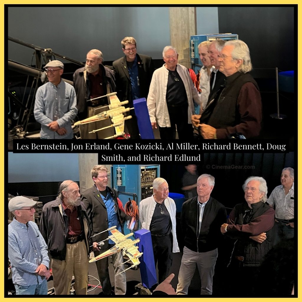 Les Bernstein, Jon Erland, Gene Kozicki, Al Miller, Richard Bennett, Doug Smith, and Richard Edlung behind the model of the X-Wing following the presentation and discussion of the Dykstraflex.