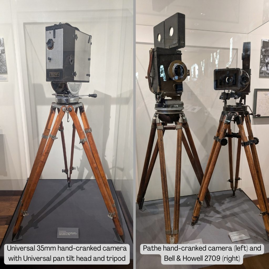 A Universal hand-cranked camera on an original Universal pan tilt head and tripod, a Pathe hand-cranked camera, and a Bell & Howell 2709 camera.