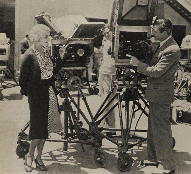 John Arnold explaining his new blimp to actress Leila Hyams in 1930